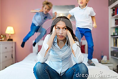 Frustrated mother with childrenÂ  Stock Photo